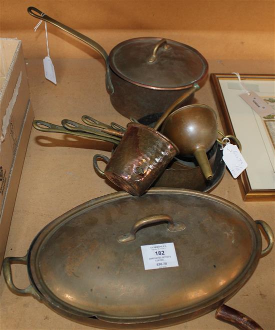 Graduated set of 6 copper saucepans,brass handles, an oval fish saucepan/ lid, a copper funnel and a circular pan with lid